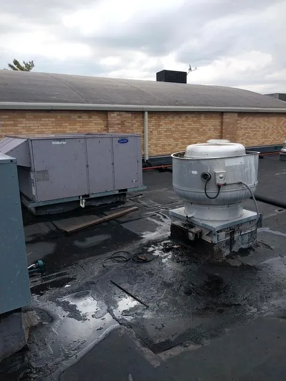Original roof conditions near mechanical equipment