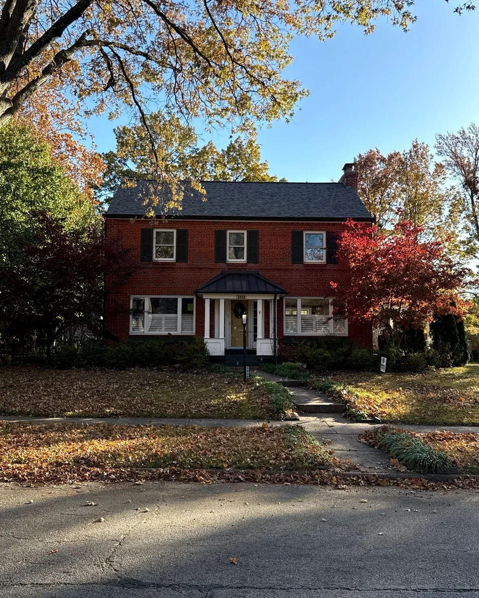 Completed architectural shingle roof with varied gray shingle tones.
